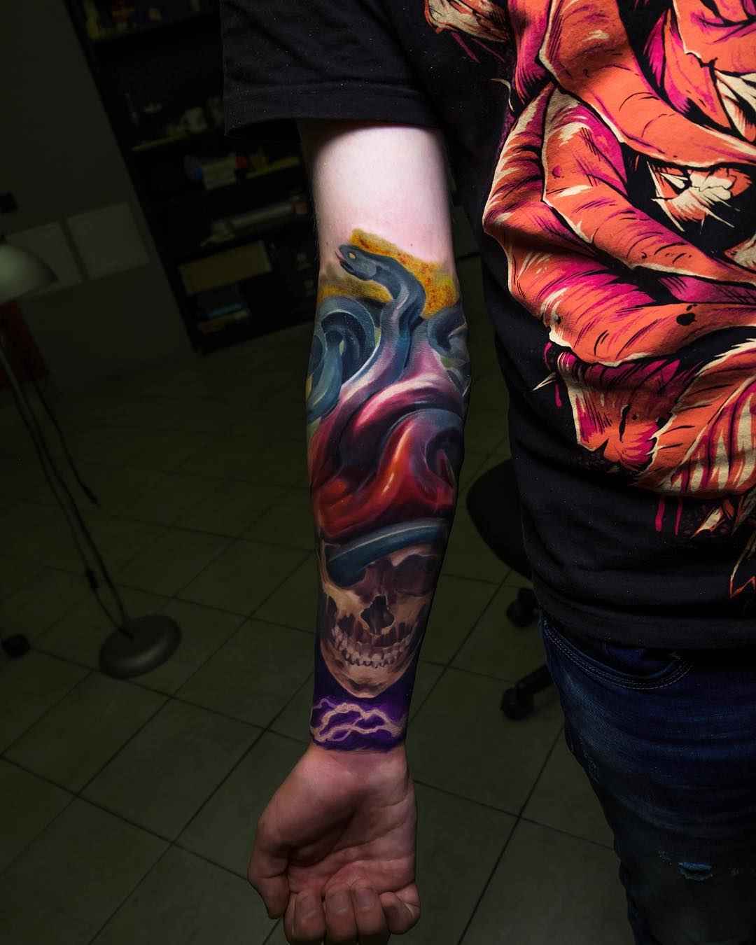 Tattoo artist Nikolay Dzhangirov color realistic tattoo