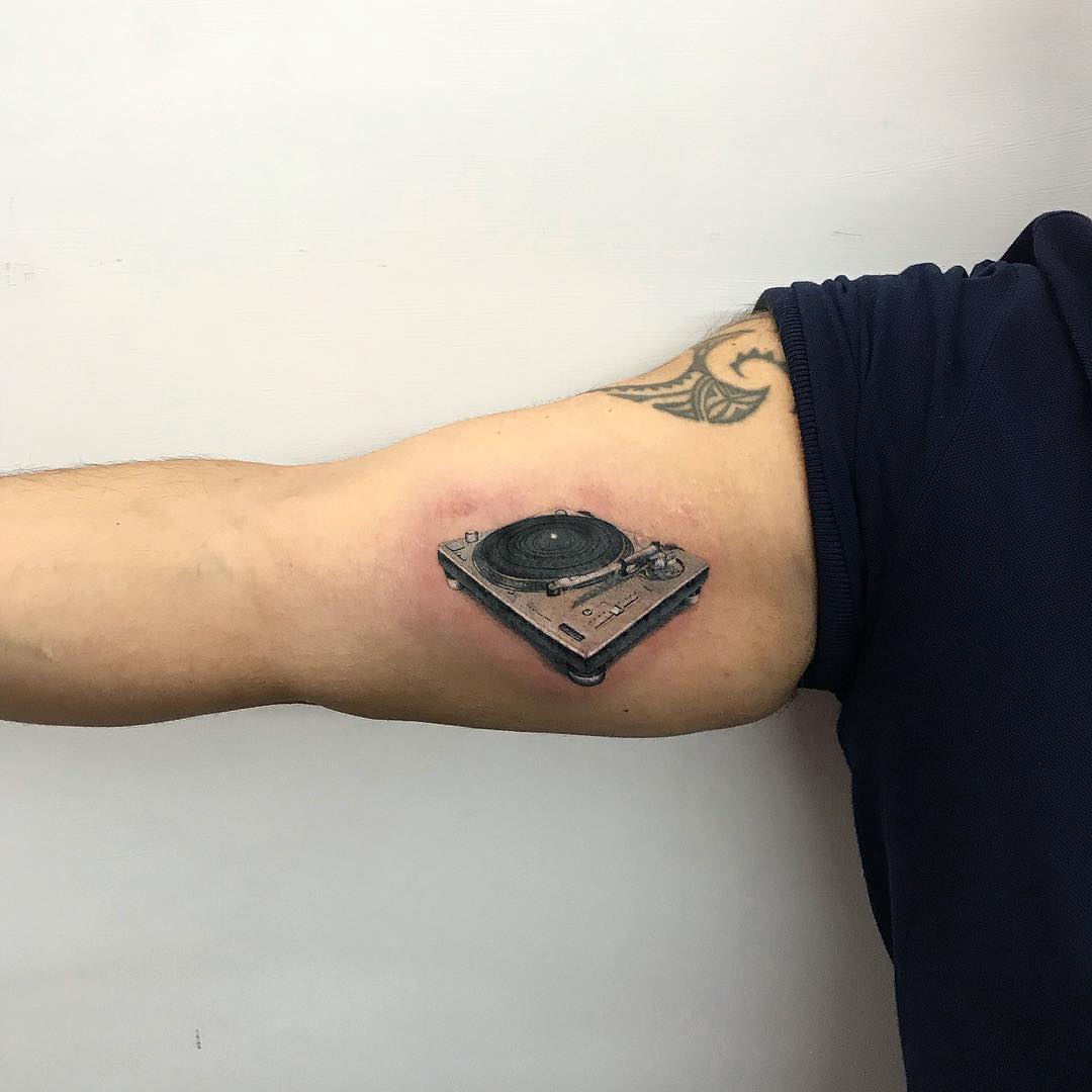 Got this about two weeks ago - my first tattoo. A record player. : r/vinyl
