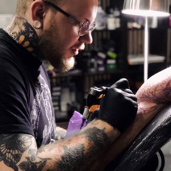 Tattoo artist Pavel Golenischev