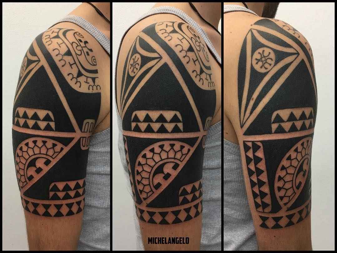 Tattoo artist Michelangelo blackwork tribal tattoo