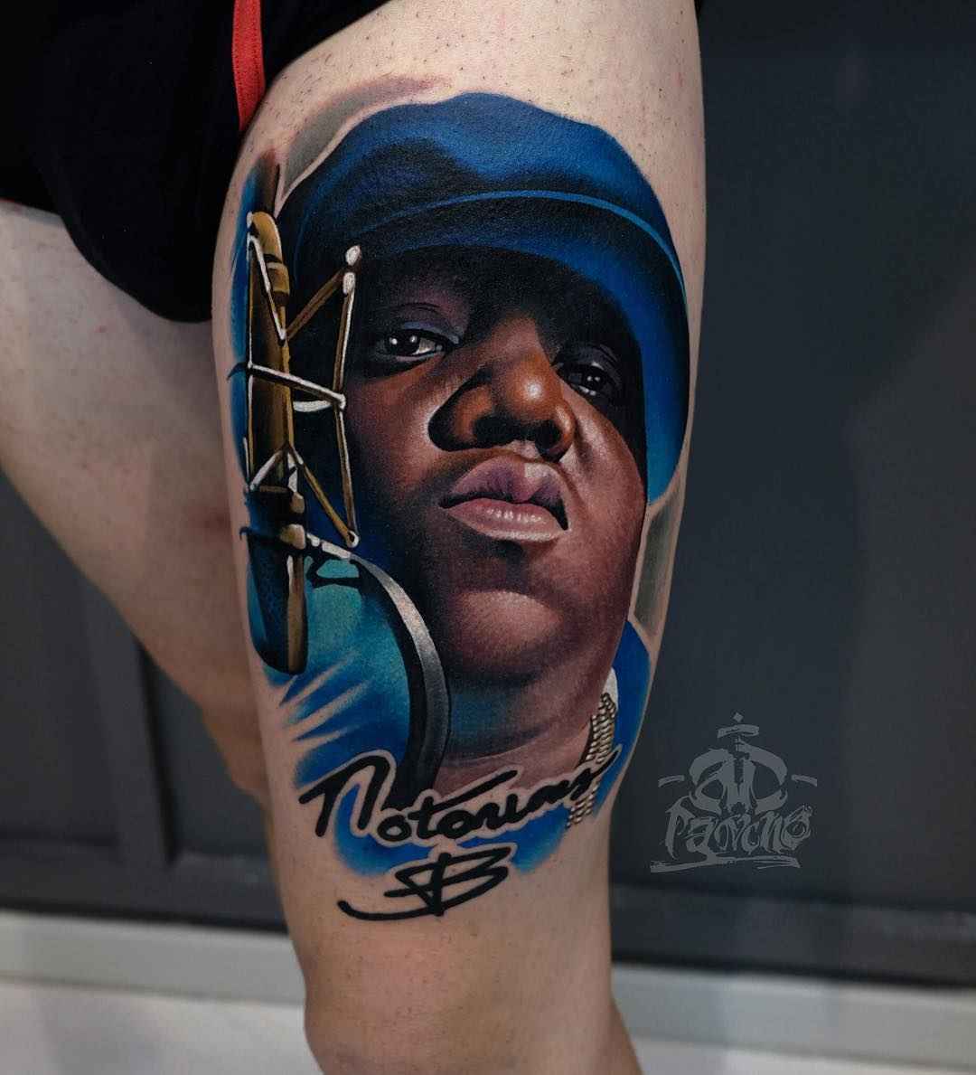 Tattoo artist A.D. Pancho color realistic design tattoo