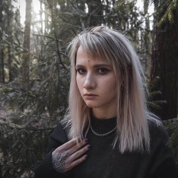 Tattoo artist Sasha Tabuns