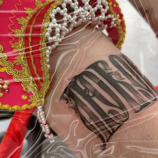 Female Black Calligraphy tattoo on Thigh #87710 | Tattoo Artist PINKA