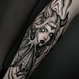 Female Black Graphic tattoo on Shin #87725 | Tattoo Artist Aleksandr Shkuratov