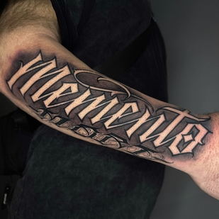 Male Black Lettering tattoo on Forearm #95156 | Tattoo Artist Spray Gun