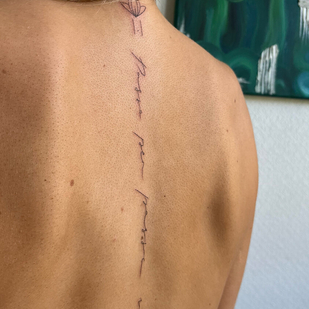 Female Black Lettering tattoo on Back #91693 | Tattoo Artist Elvira Volodarskaya