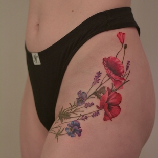 Female Color Realism tattoo on Thigh #95034 | Tattoo Artist Polina Red Head