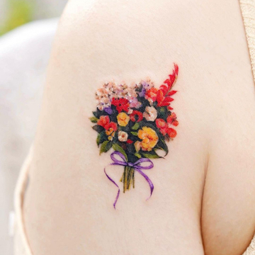 Serenity in colorful Tilda's tattoos