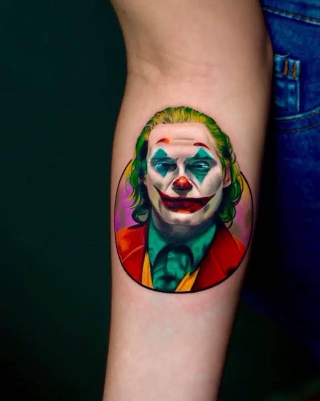The best tattoos with Joaquin Phoenixs Joker  iNKPPL  Joker tattoo Joker  tattoo design Forearm band tattoos