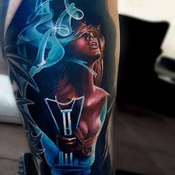 Incredible color realism tattoo by Vasiliy Suvorov