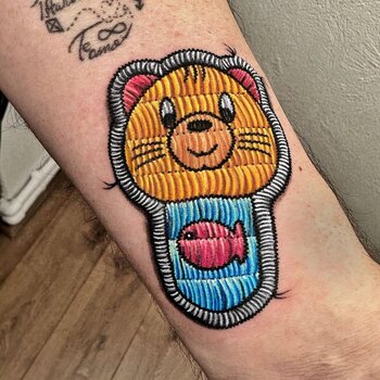 Artista del tatuaje muslubash