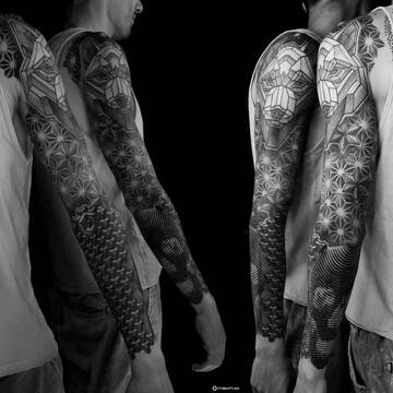 Ornamental tattoo by Maxim Zhuravlev