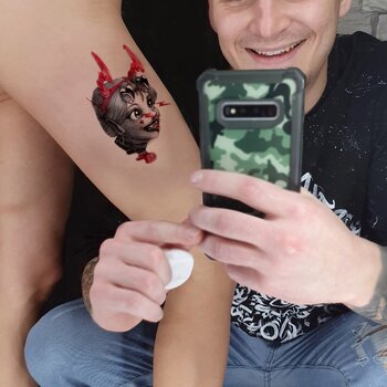 Artiste tatoueur Dmitriy Garshin