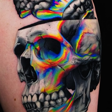 L'arte dei glitch: l'artista del tatuaggio Pavlo Pozhydaiev e il suo realismo dei glitch