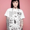 Artista di tatuaggi, modello e star della televisione Grace Neutral