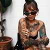 Modello tatuato e blogger della moda Sammi Jefcoate