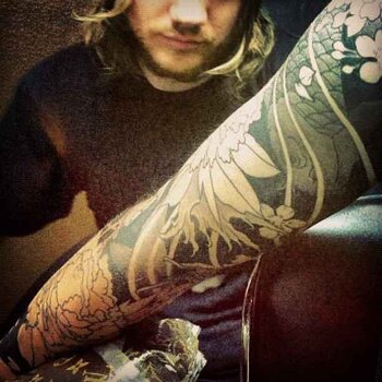 Tatuatore Justin Hartman