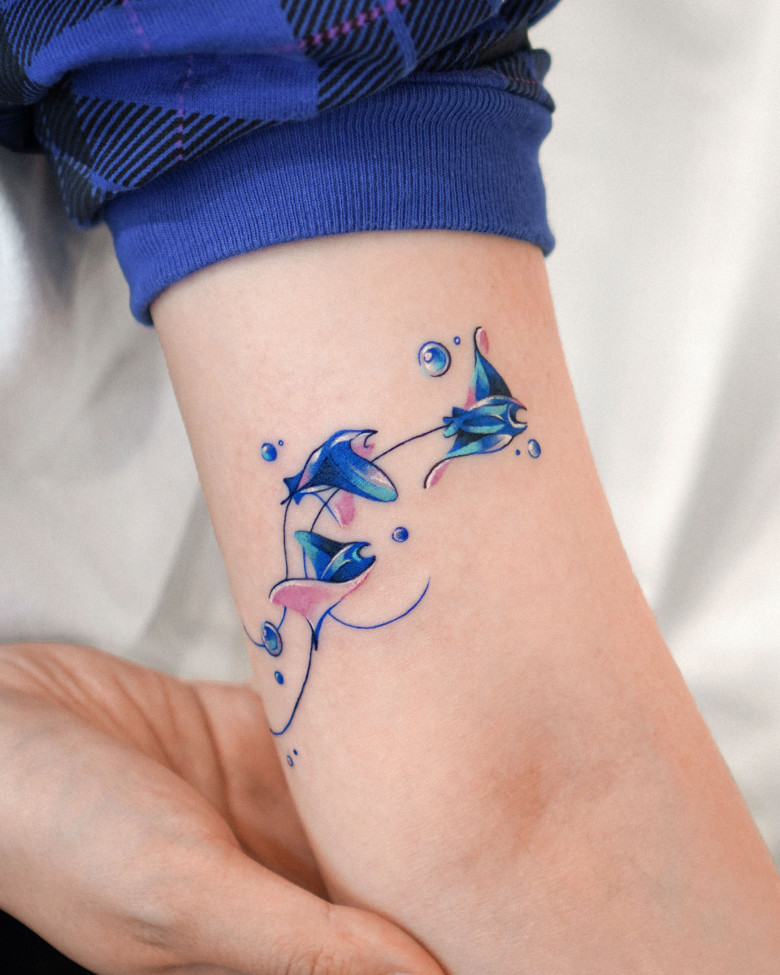 Color stingrays tattoo by Eden