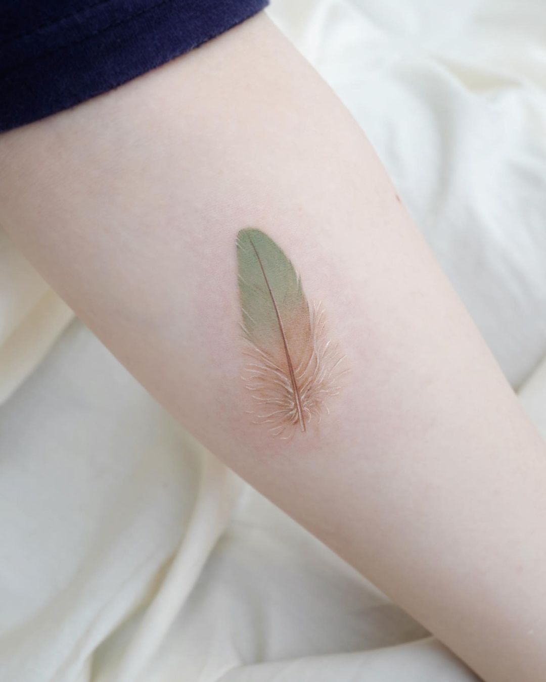 Delicate Feather tattoo