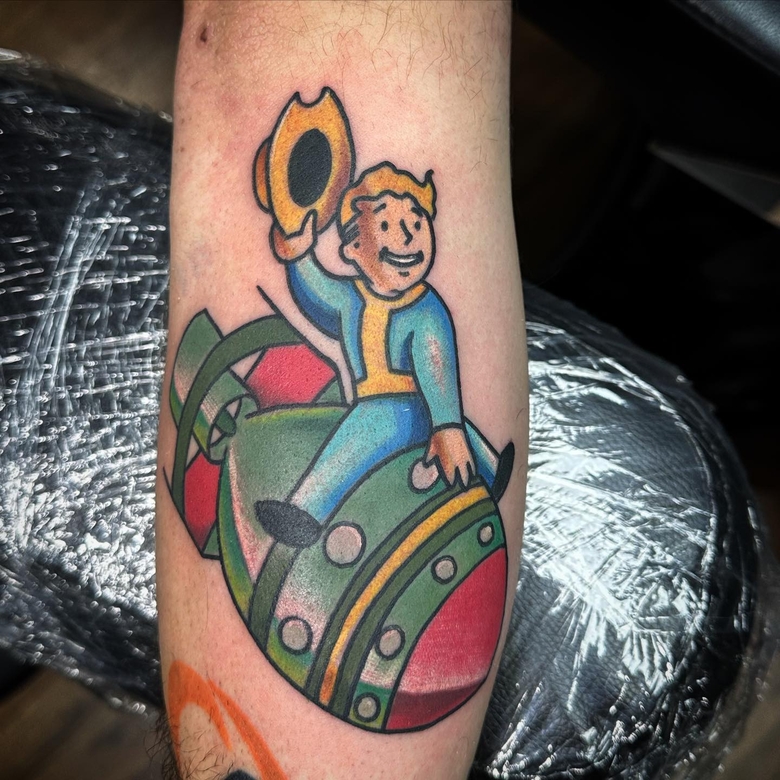 fallout, tattoo, gallery, photos @brandon_smith_tattoo color,old school,vault boy upon the nuclear bomb