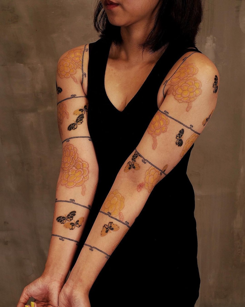 Padrão tradicional coreano Dancheong nas tatuagens de Nyouung