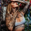 Artista de tatuagem e modelo Sabrina Sawyers