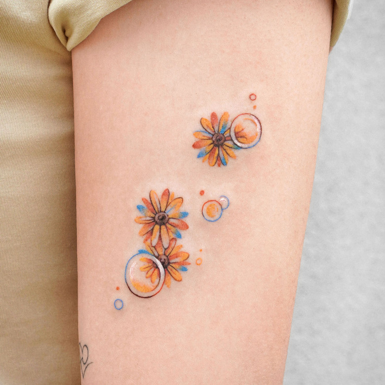 Flowers tattoo by Eden