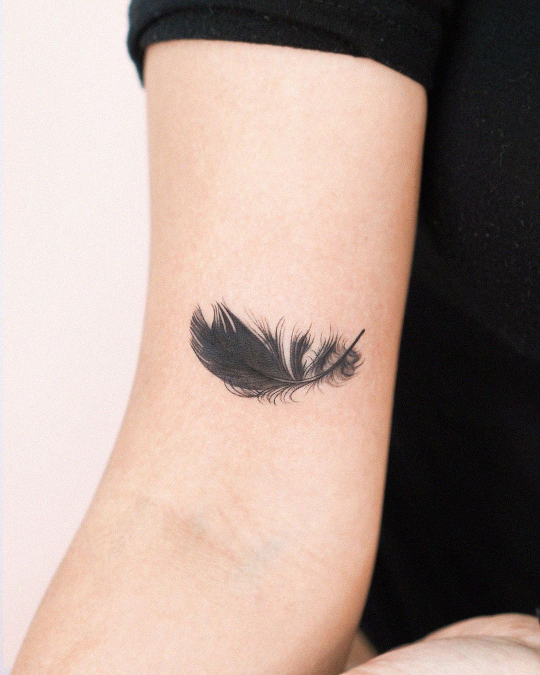 Black Feather tattoo