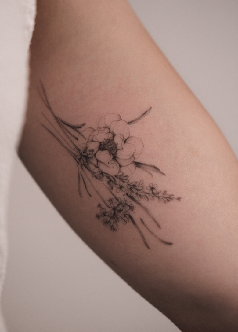 Fine line flower tattoo by Ksenia Way Ink