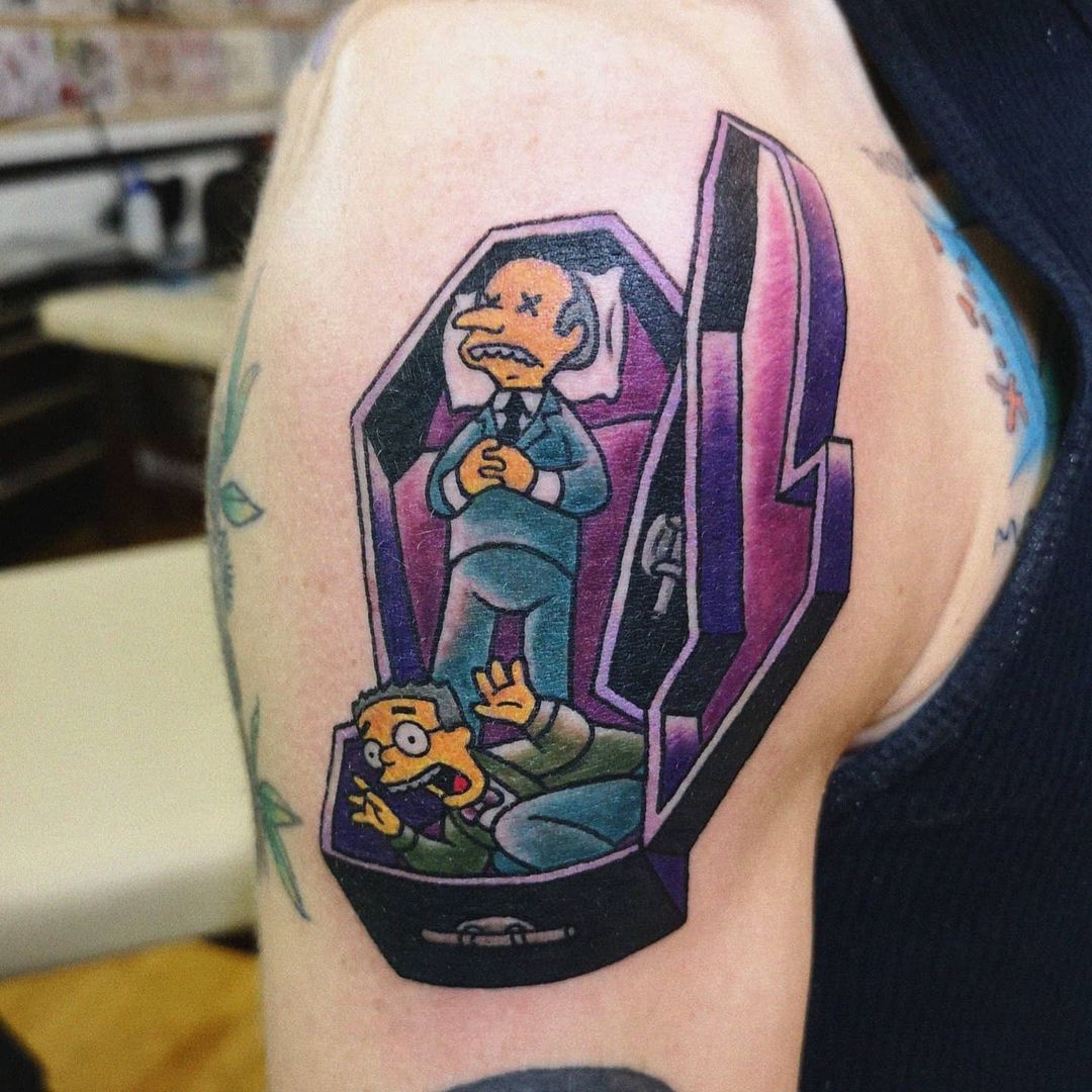 tattoo Mr. Burns and Waylon Smithers in coffin