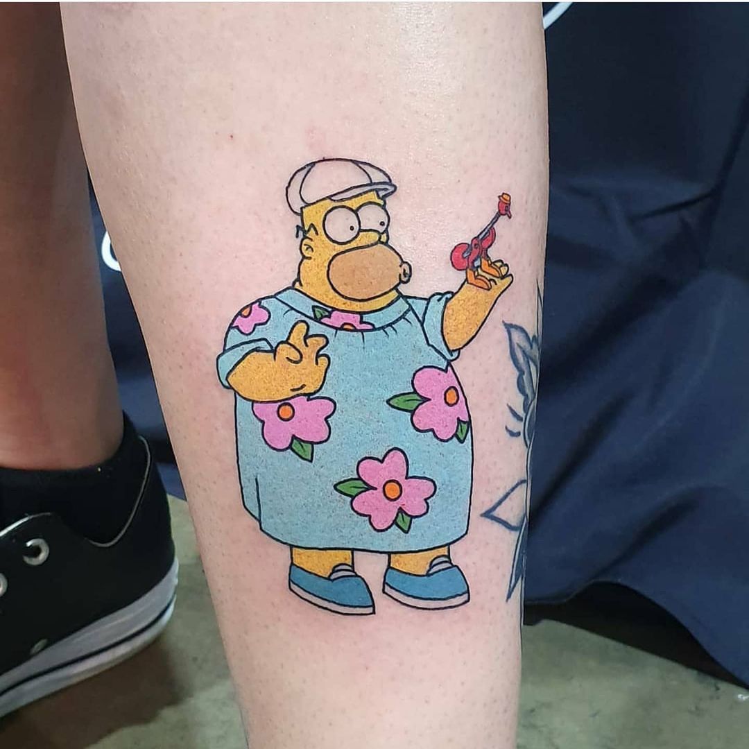 Fat Homer Simpson with a toy bird tattoo