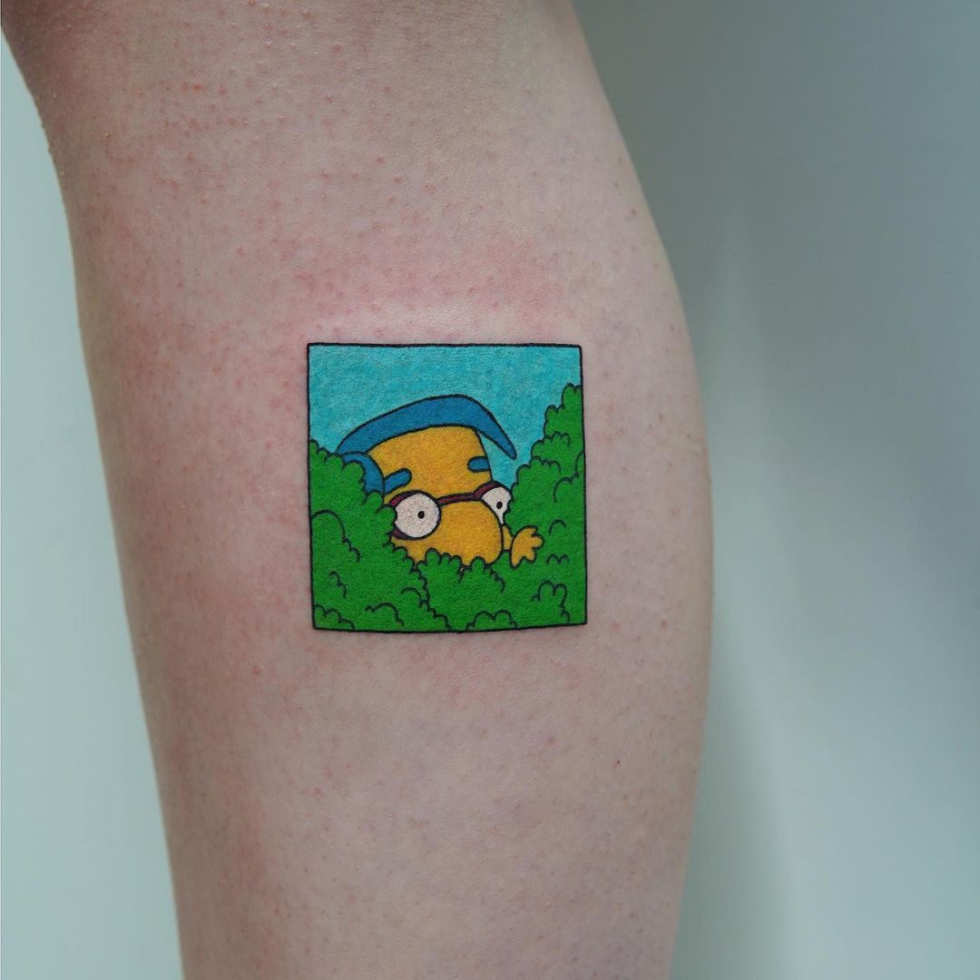 Milhouse peeking out of the bushes tattoo