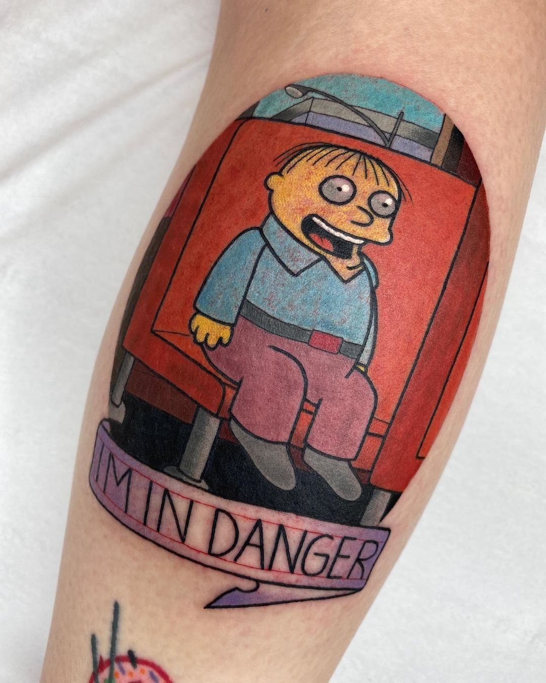 Ralph in bus tattoo
