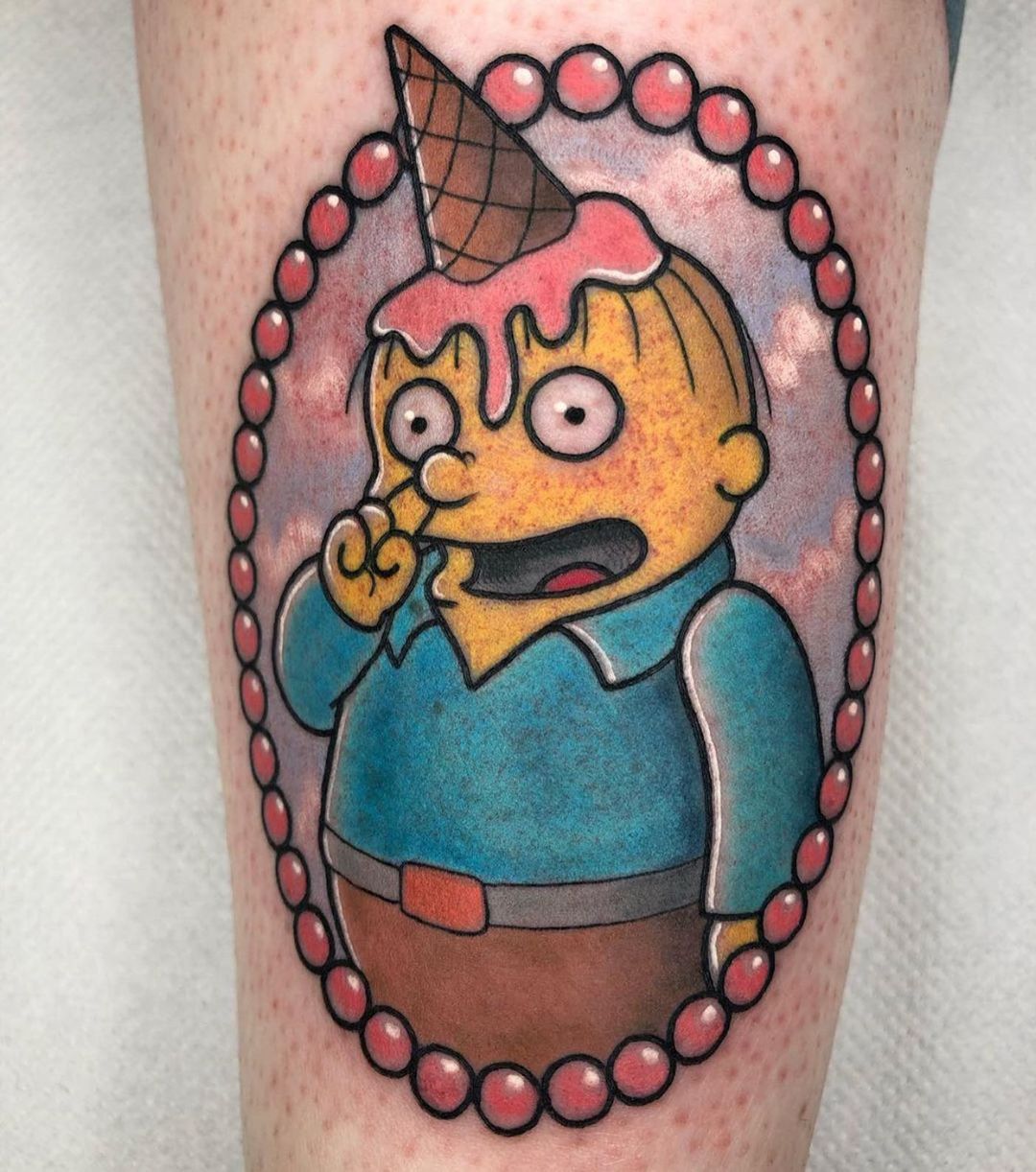 Ralph the unicorn tattoo based on The Simpsons