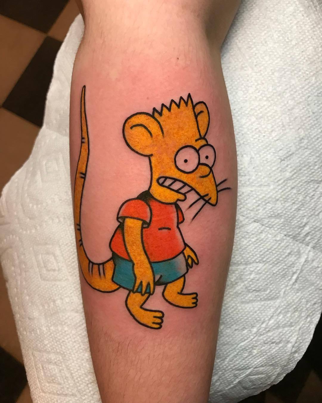 Bart Simpson is a rat tattoo.