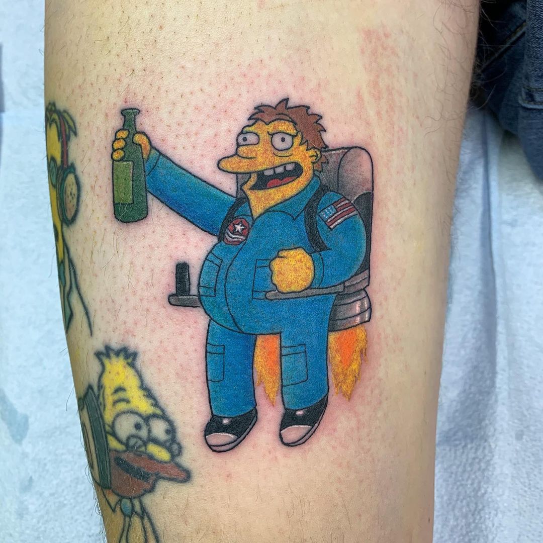 Barney Gumble astronaut tattoo