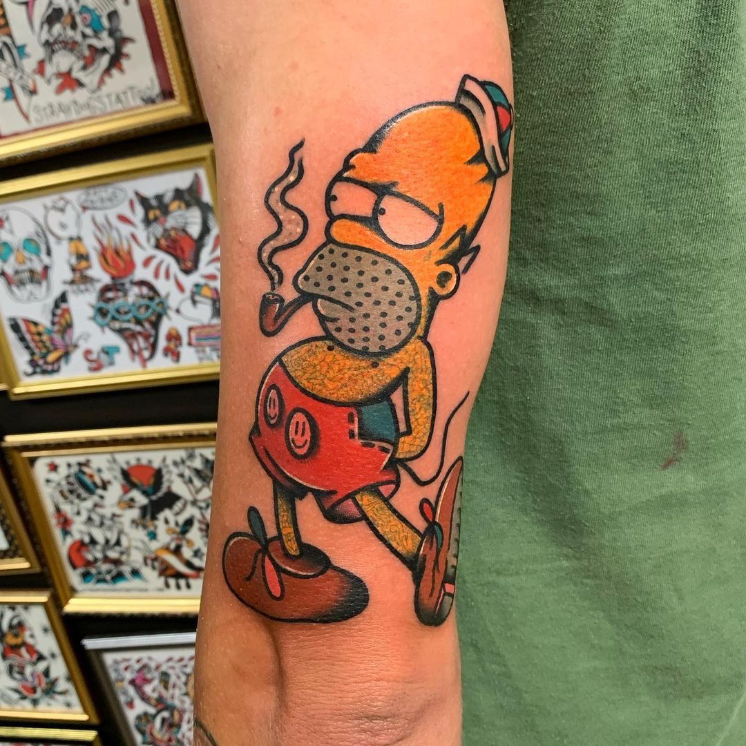 Homer Simpson old school Mickey Mouse tattoo