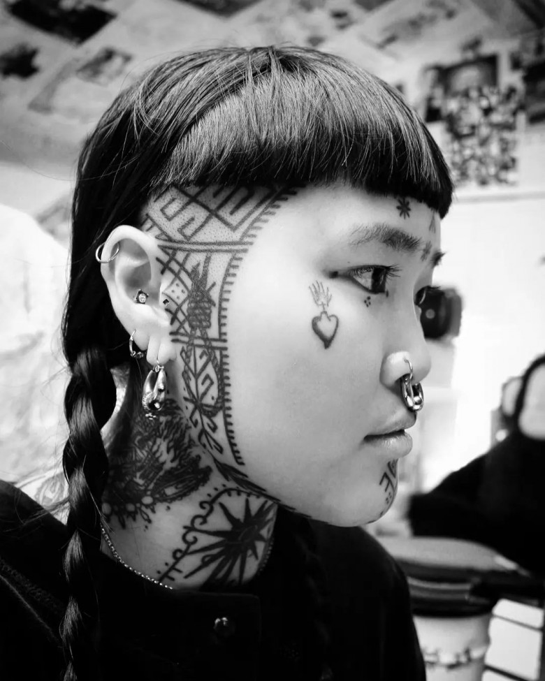 Candice Soleillant face tattoos