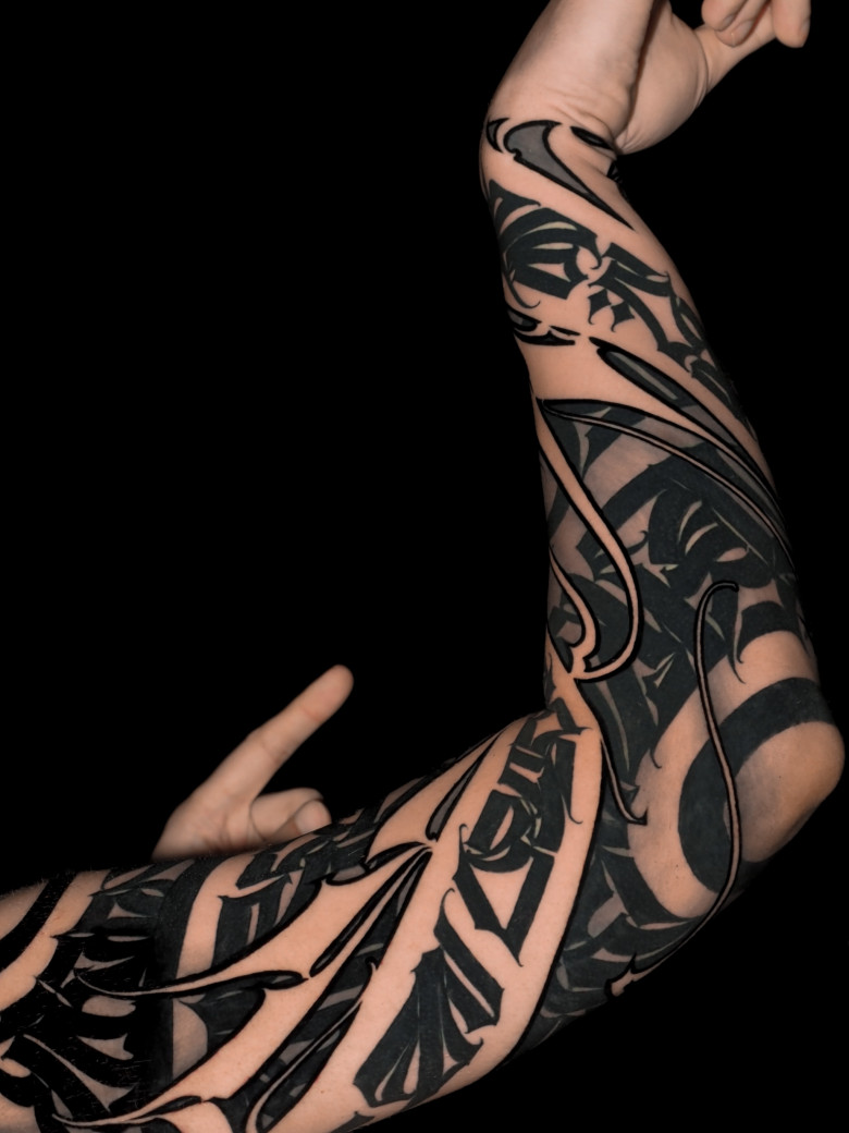 inscription tattoo for a programmer - master Igor Klimin